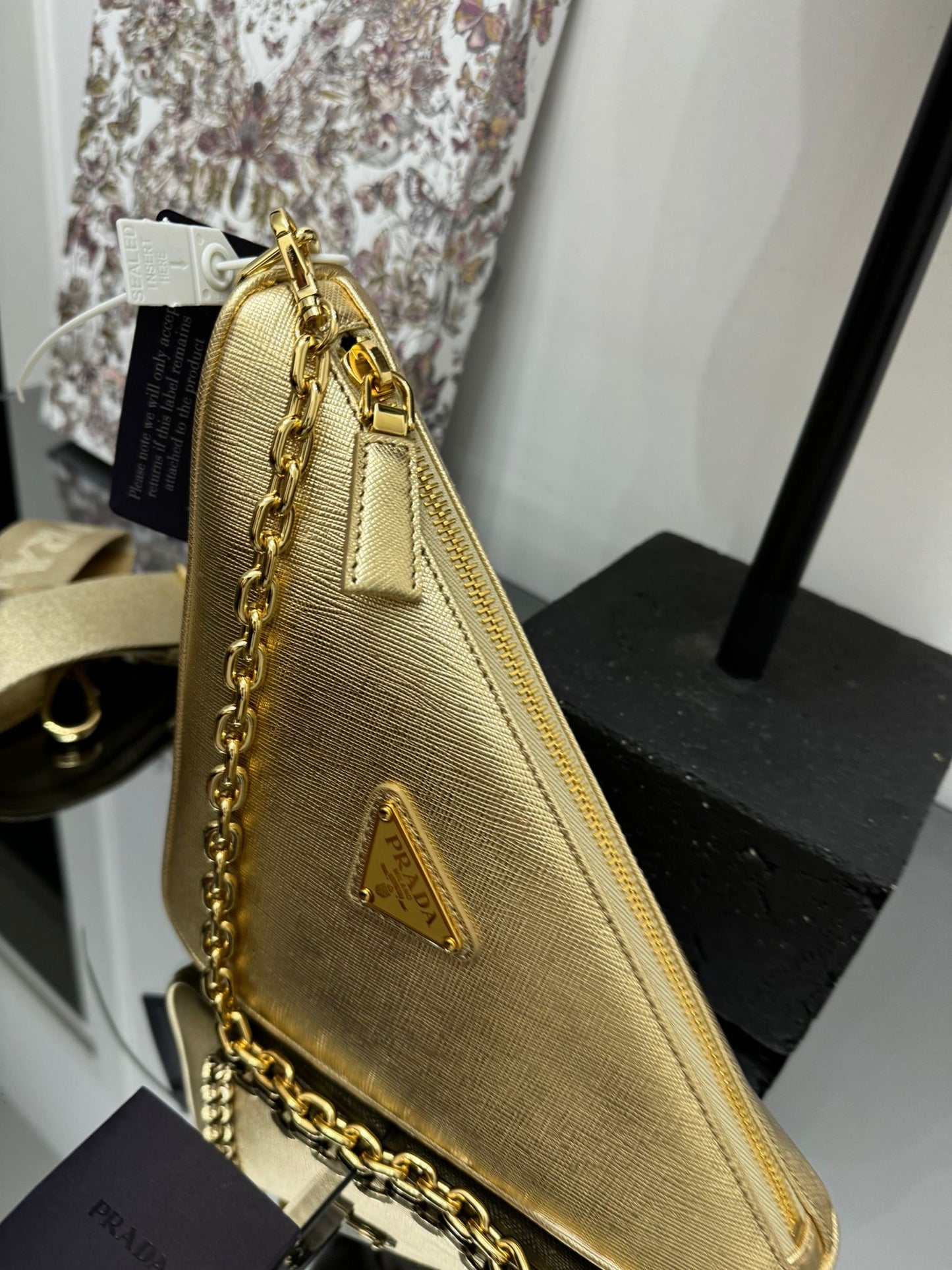 Gold leather triangle bag