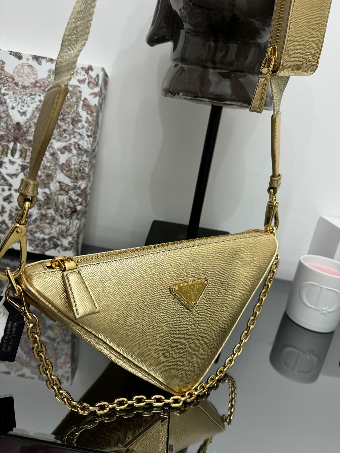 Gold leather triangle bag
