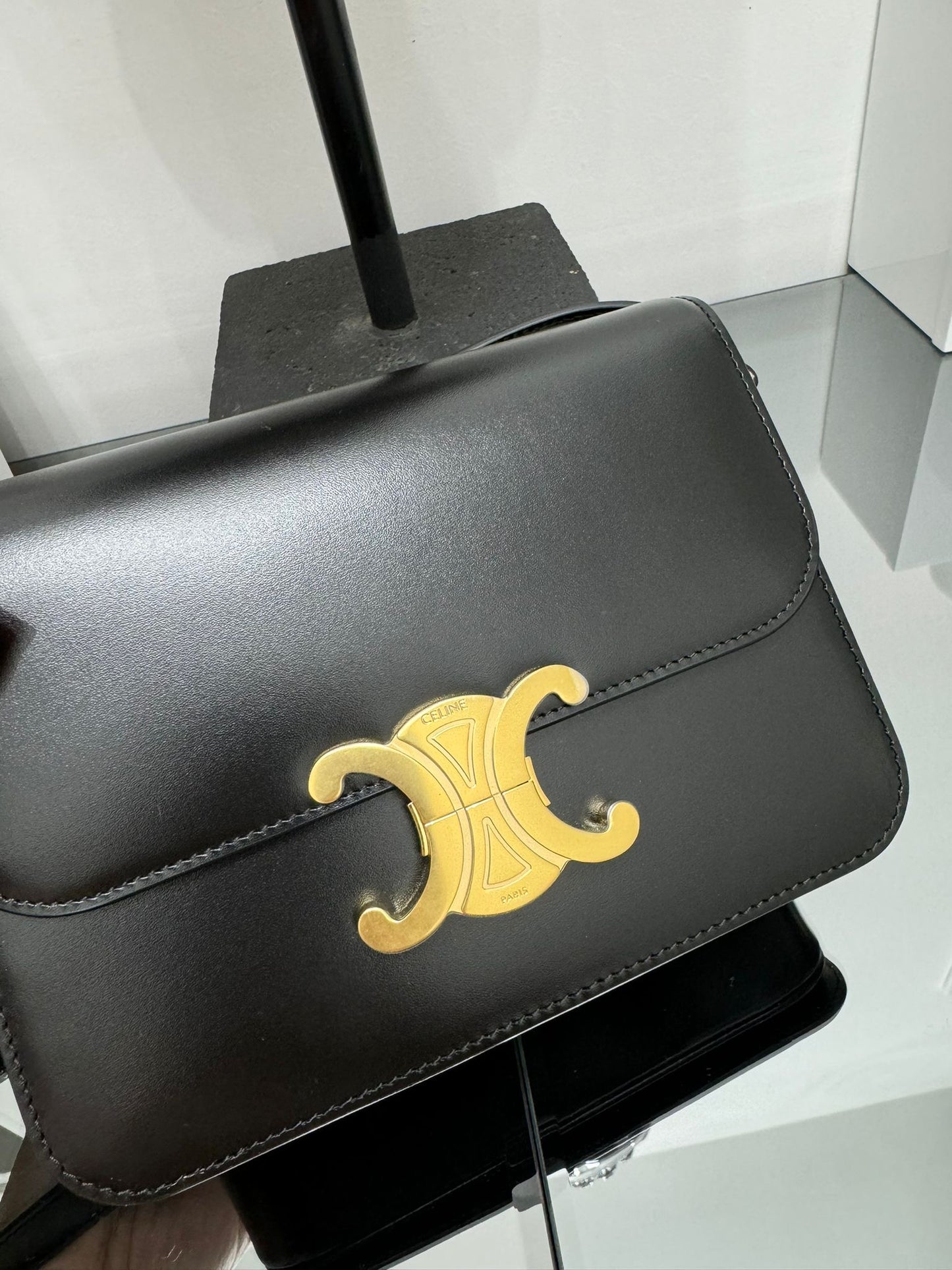 TEEN TRIOMPHE BAG IN BLACK POLISHED CALFSKIN
