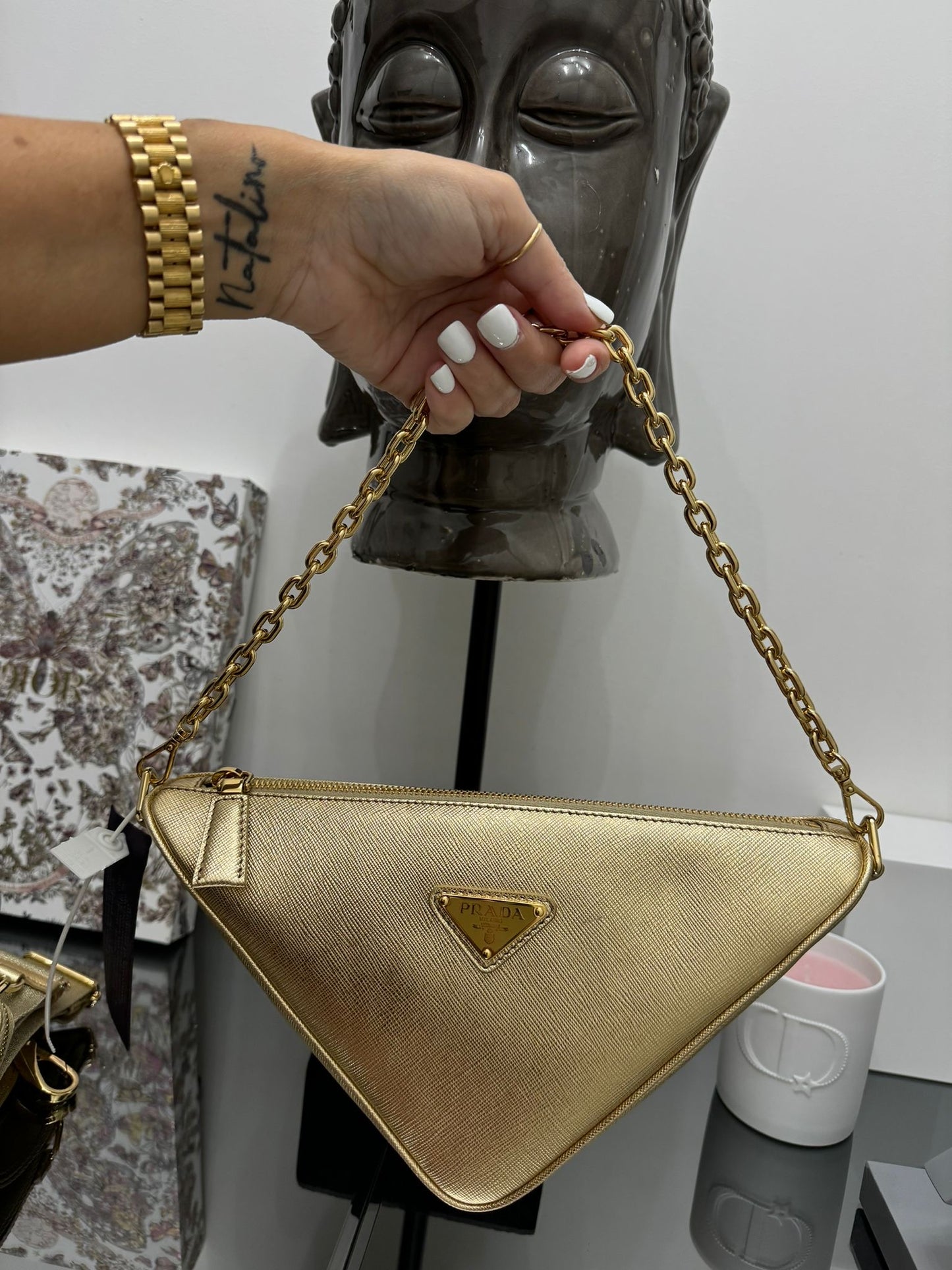 Gold leather triangle bag