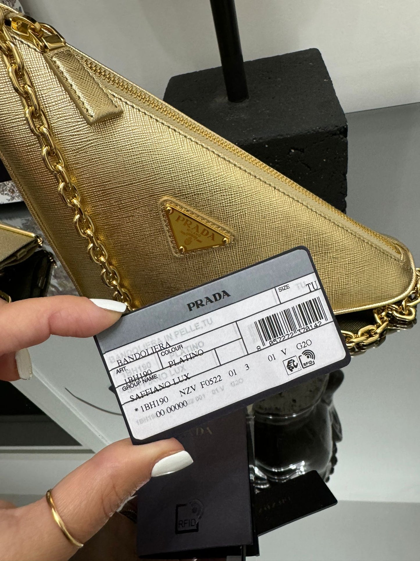 Gold leather triangle bag