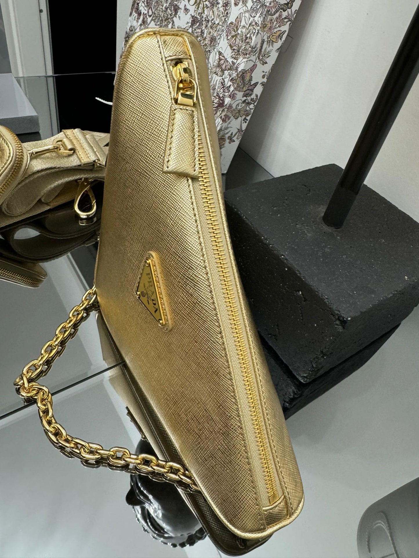 Gold leather triangle bag