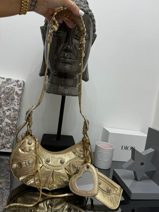 Le Cagole XS shoulder bag in gold nappa