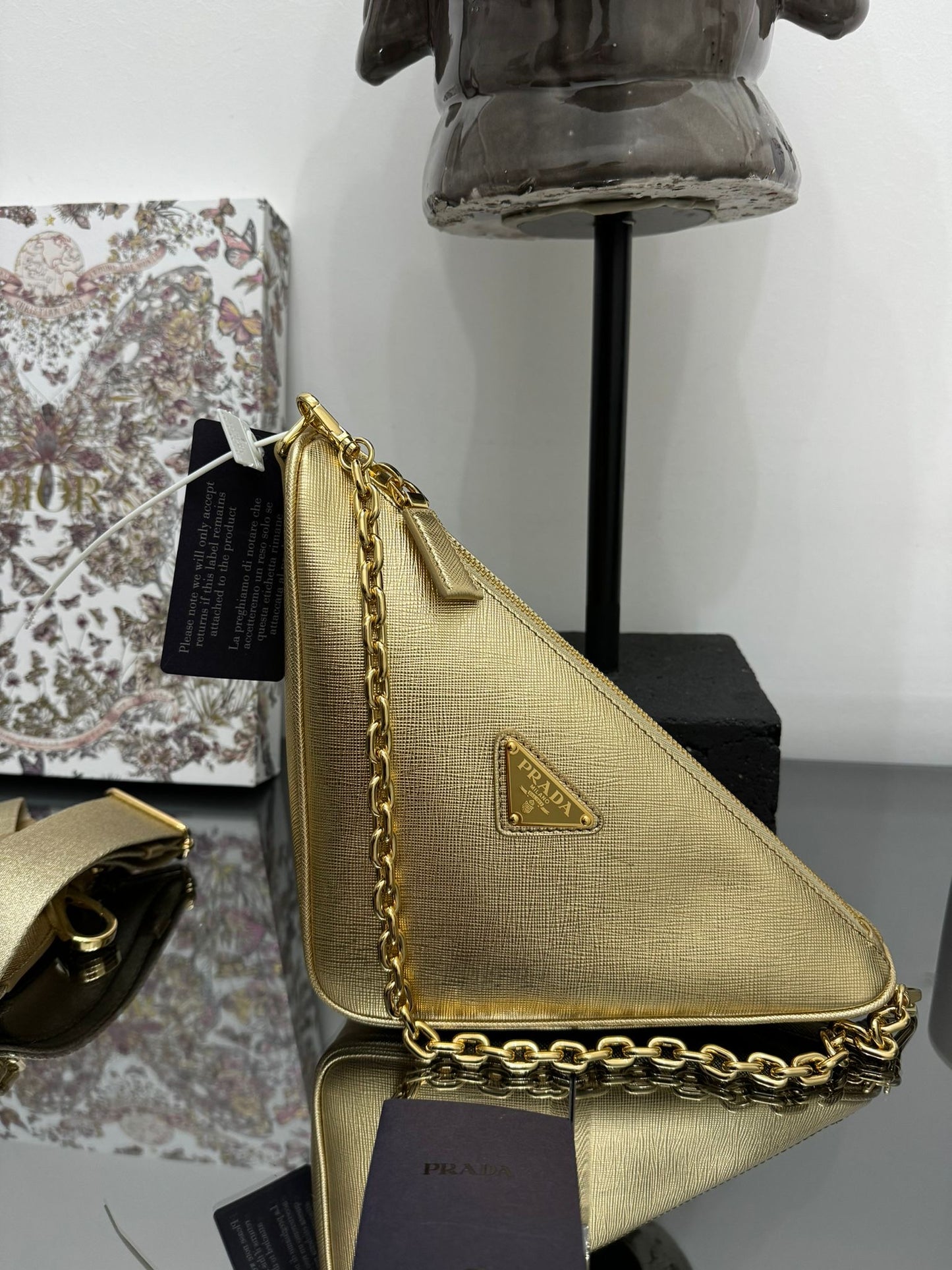 Gold leather triangle bag
