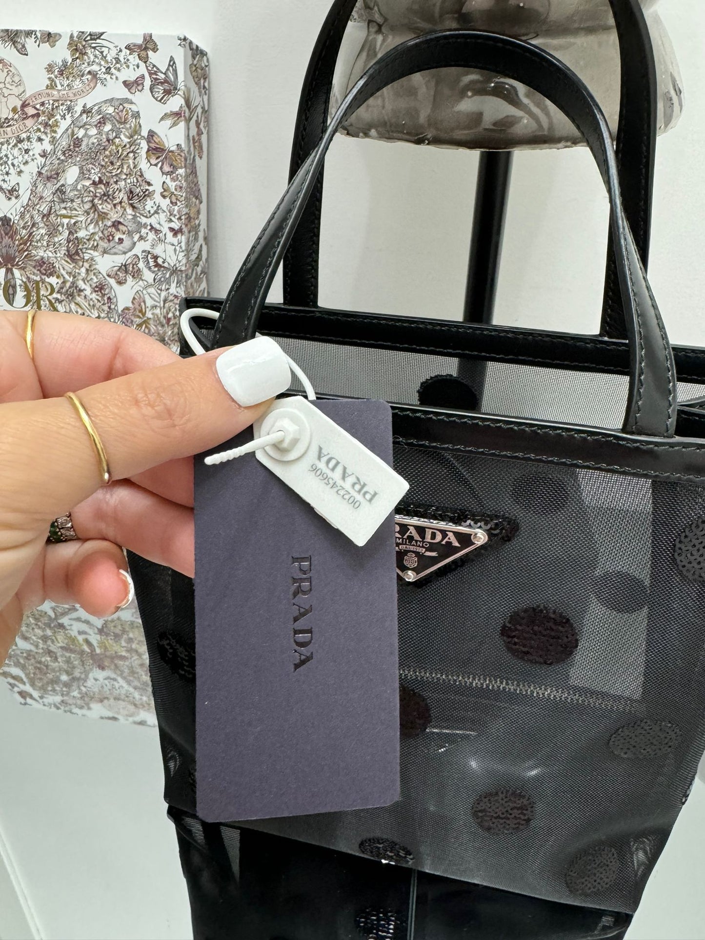 Small bag in mesh and leather with black sequins