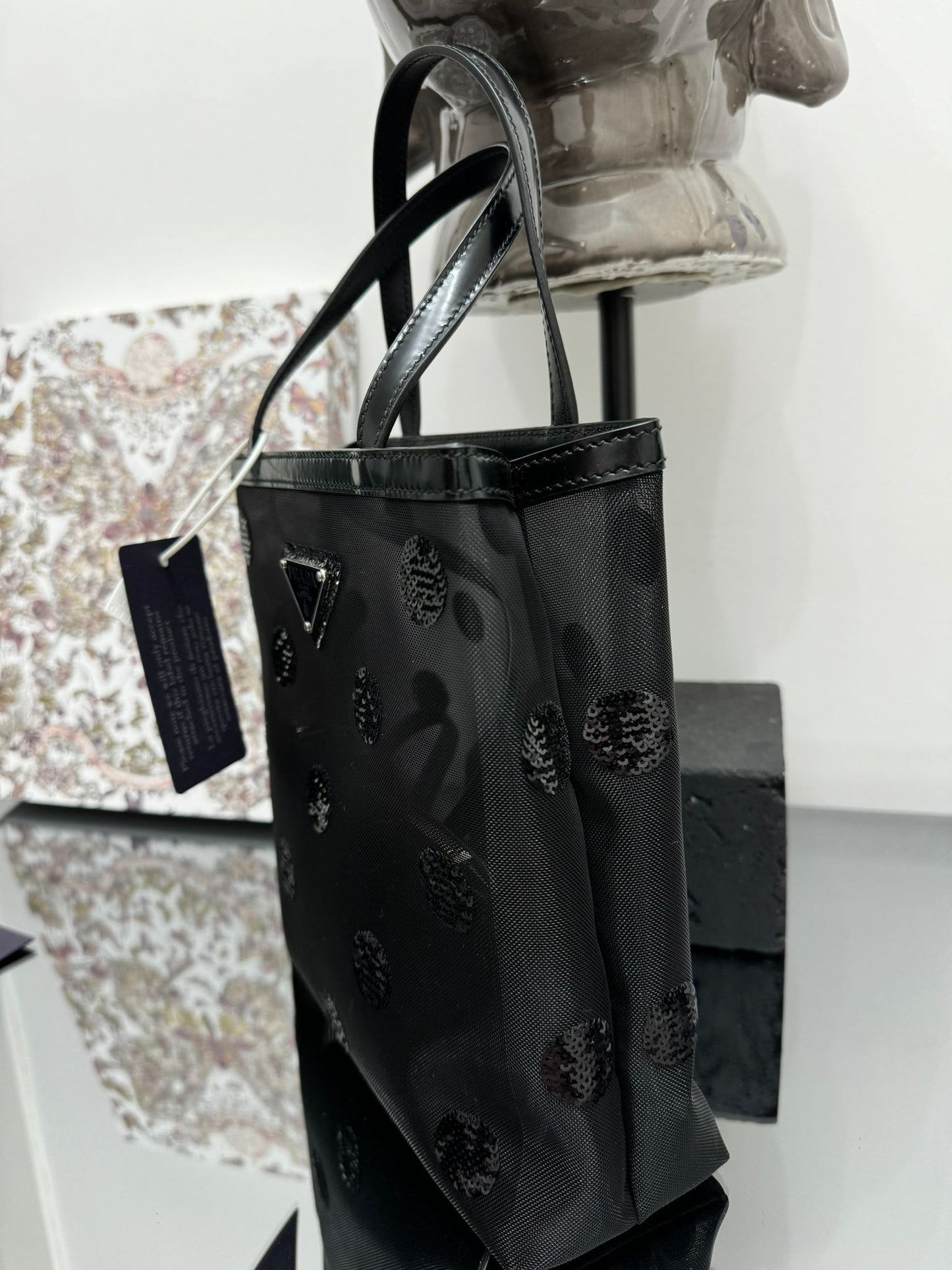 Small bag in mesh and leather with black sequins