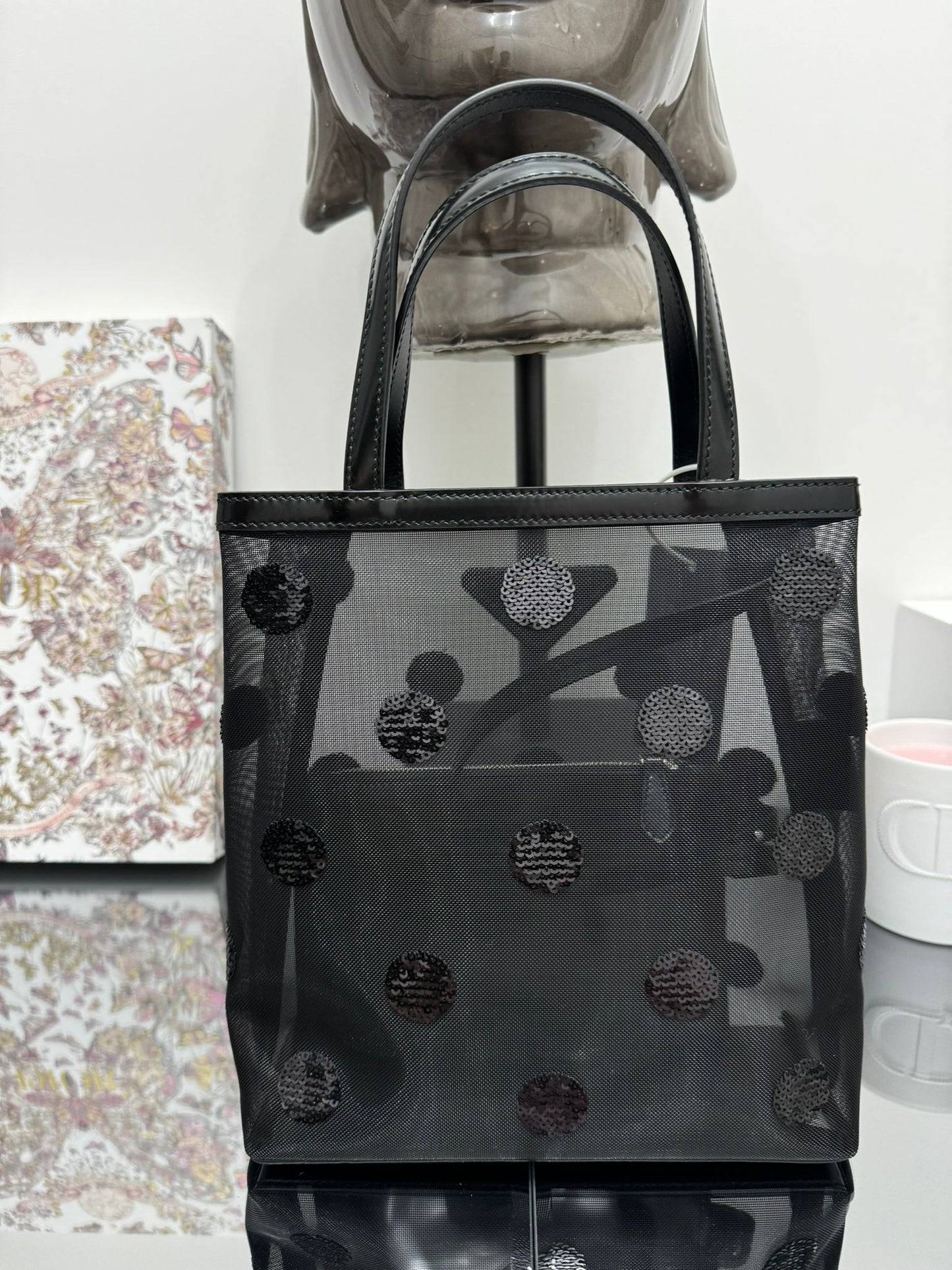 Small bag in mesh and leather with black sequins