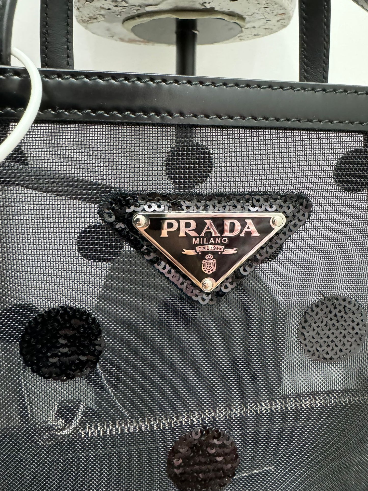 Small bag in mesh and leather with black sequins