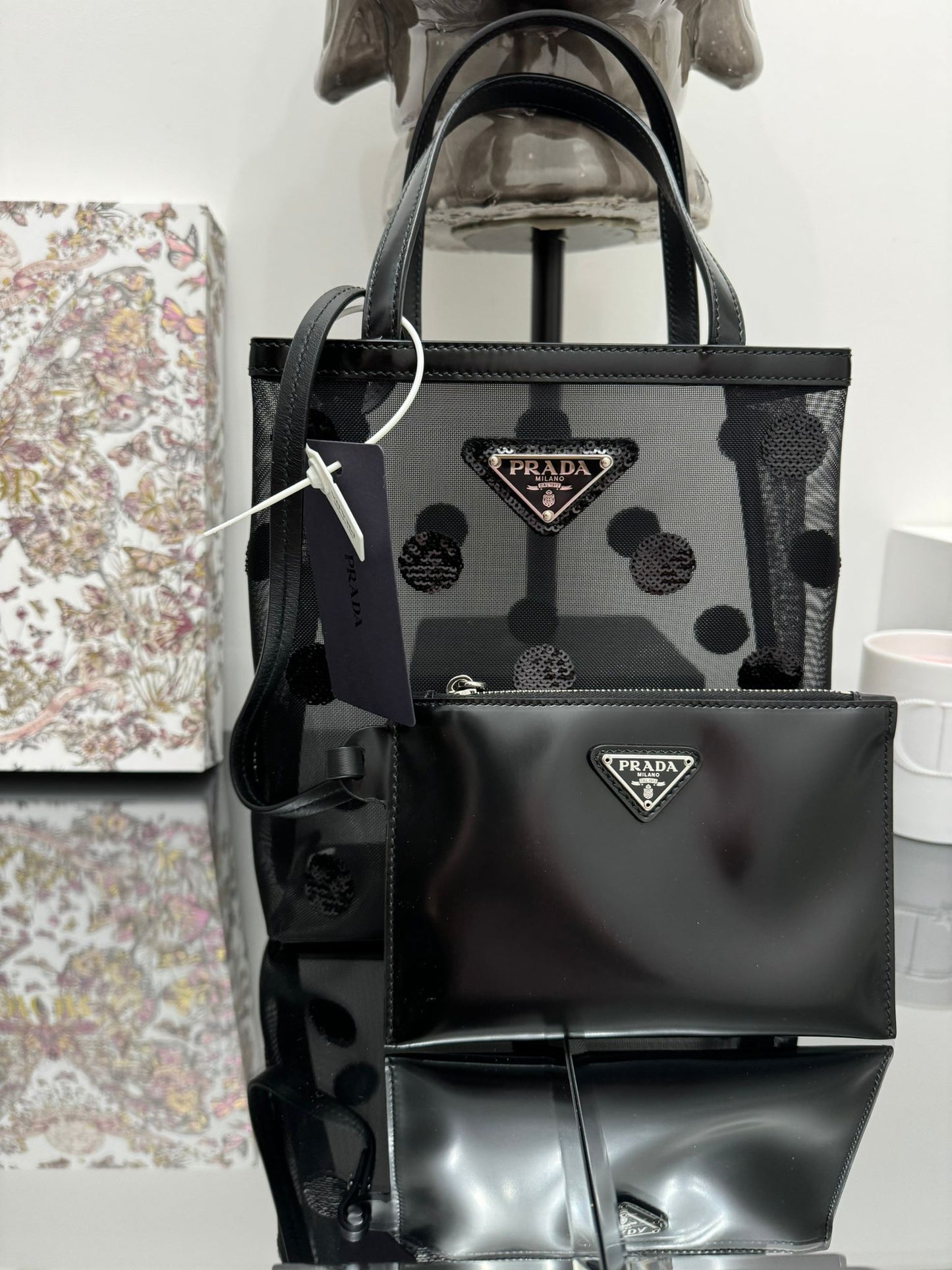 Small bag in mesh and leather with black sequins