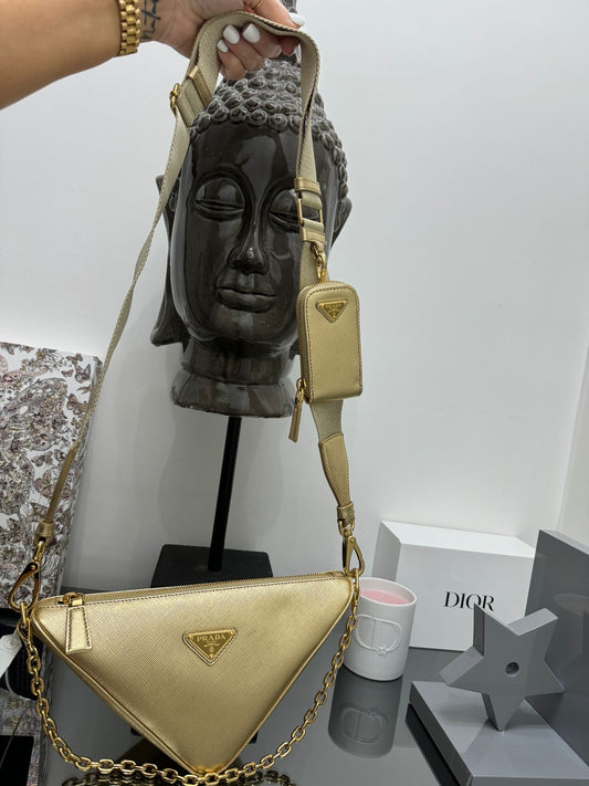 Gold leather triangle bag
