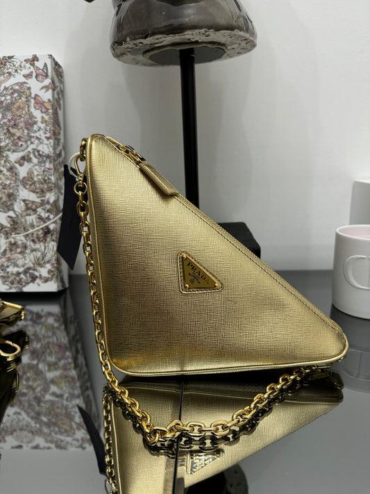 Gold leather triangle bag