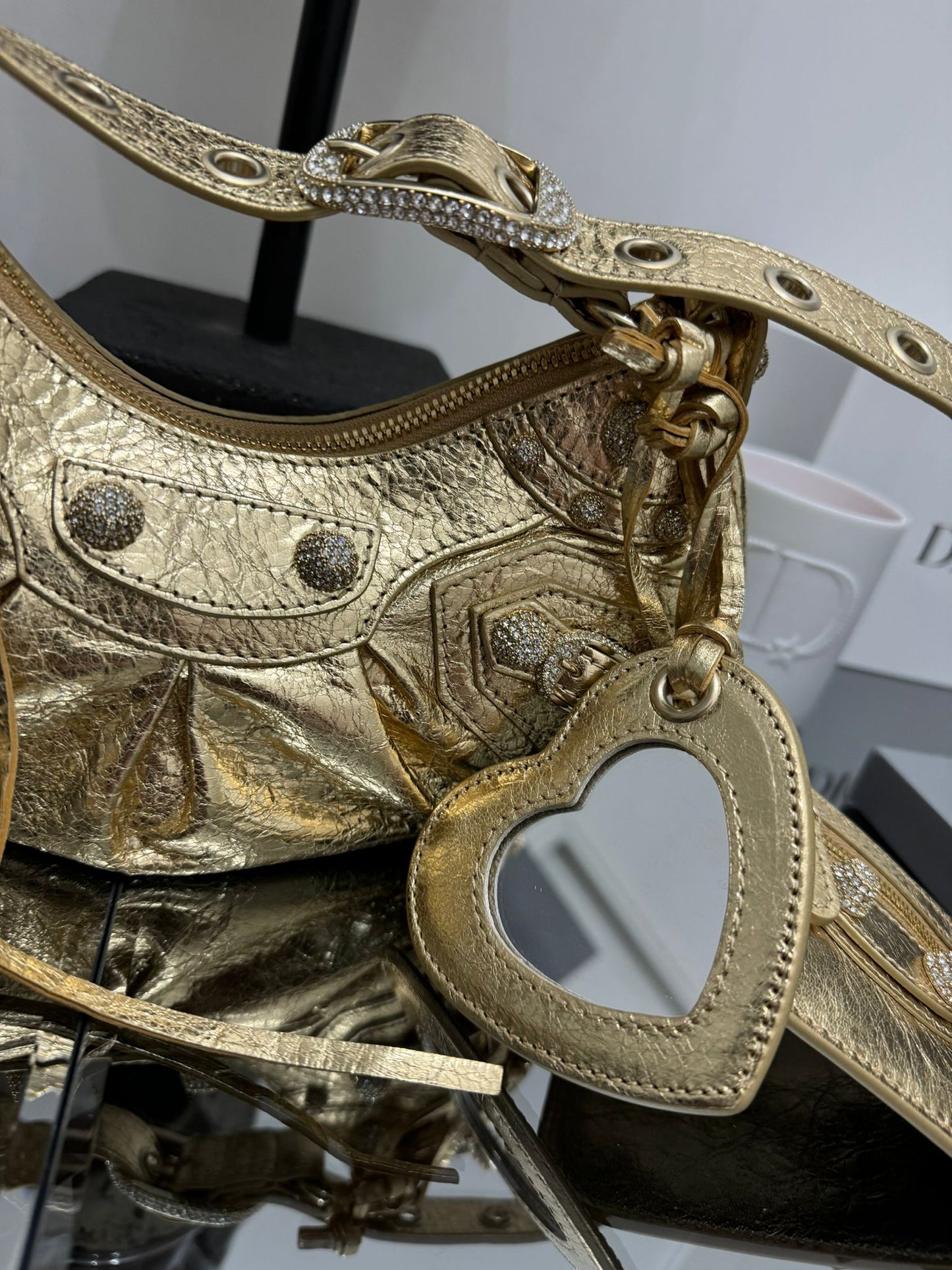 Le Cagole XS shoulder bag in gold nappa